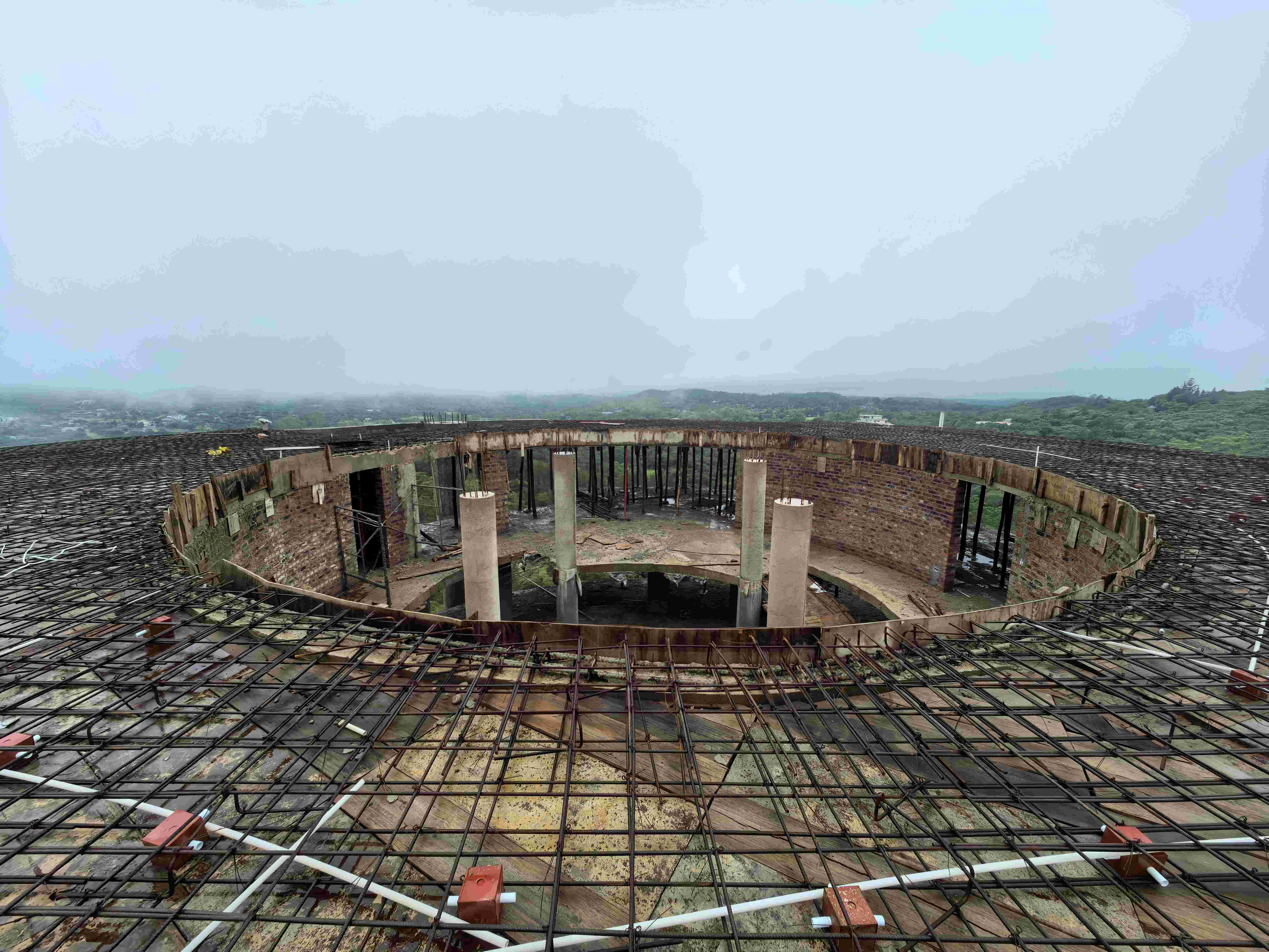 Aerial view of a curved structural build with reinforcement by Martcosy Construction